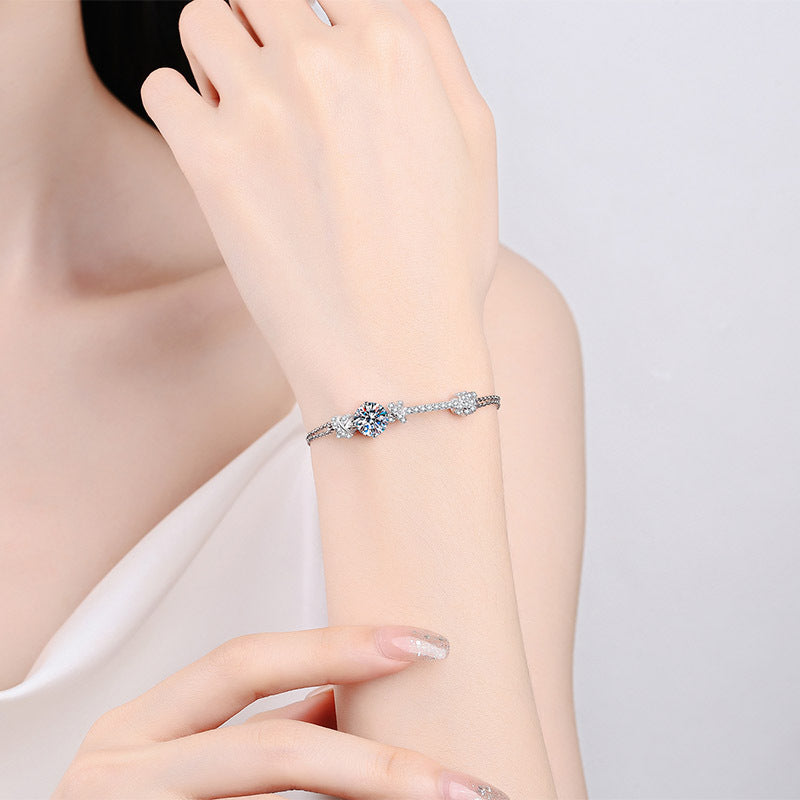 Elegant Cross Style Round Moissanite Bracelet