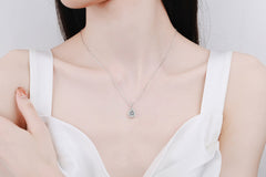 Timeless Pear Moissanite Halo Pendant